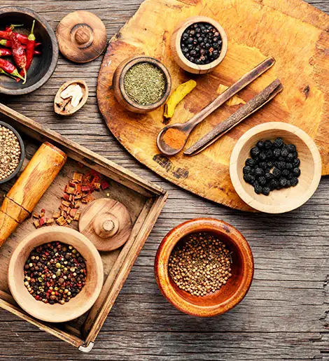 Spices laid out on a wooden board
