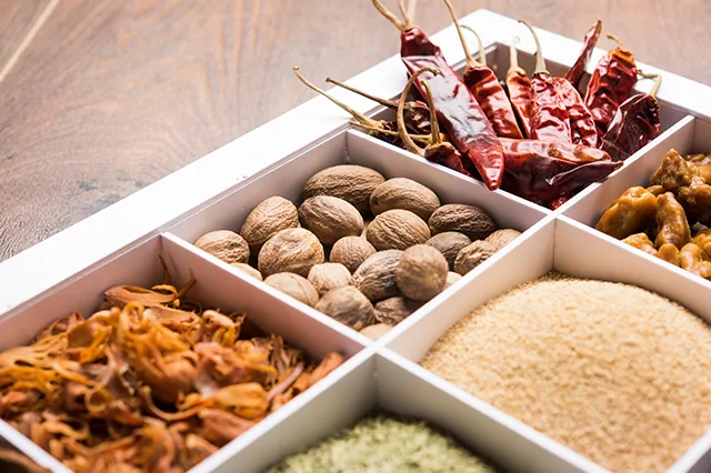 Whole seeds and pods in a tray