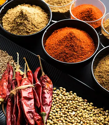 Ground spices on a dark surface
