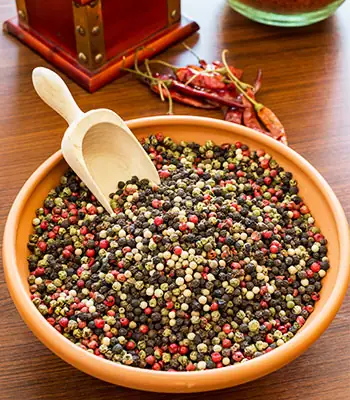Whole spices on a wooden board