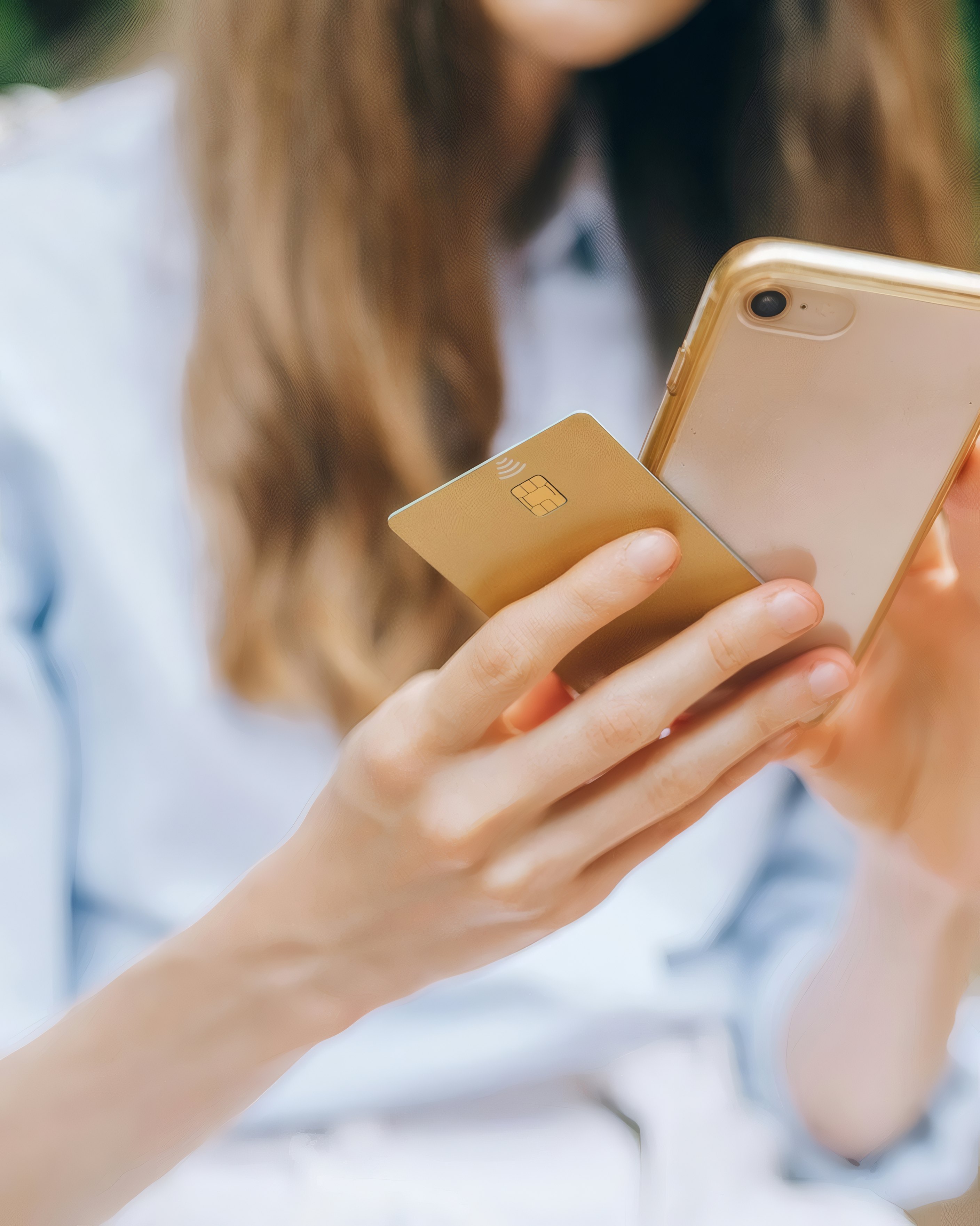 A woman paying with her phone