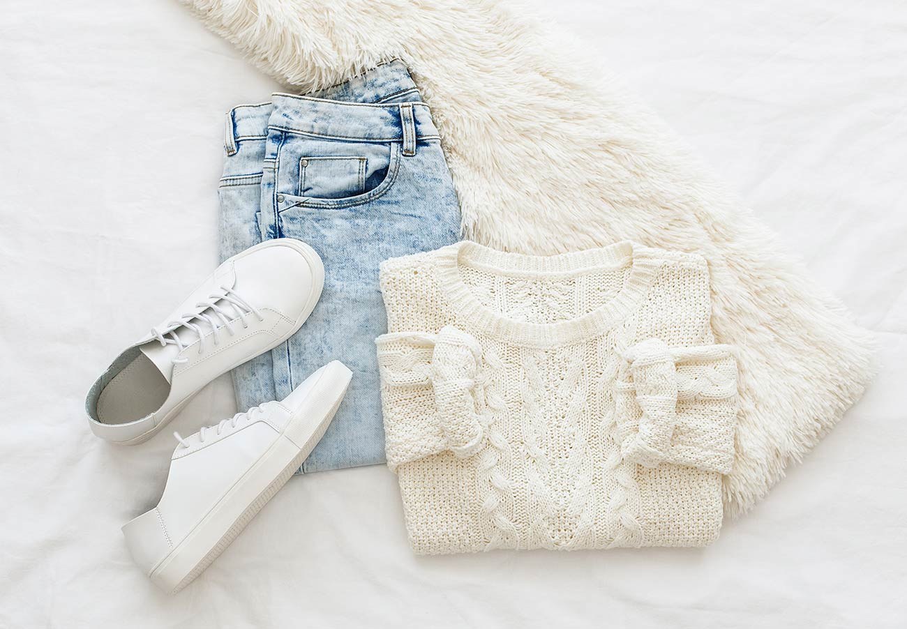 Rose satin sneakers laid out flat
