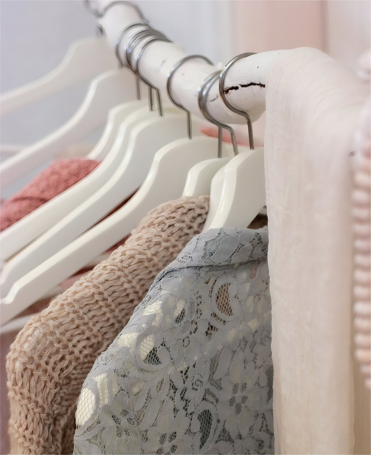 Lace blouses and knits on a boutique rail