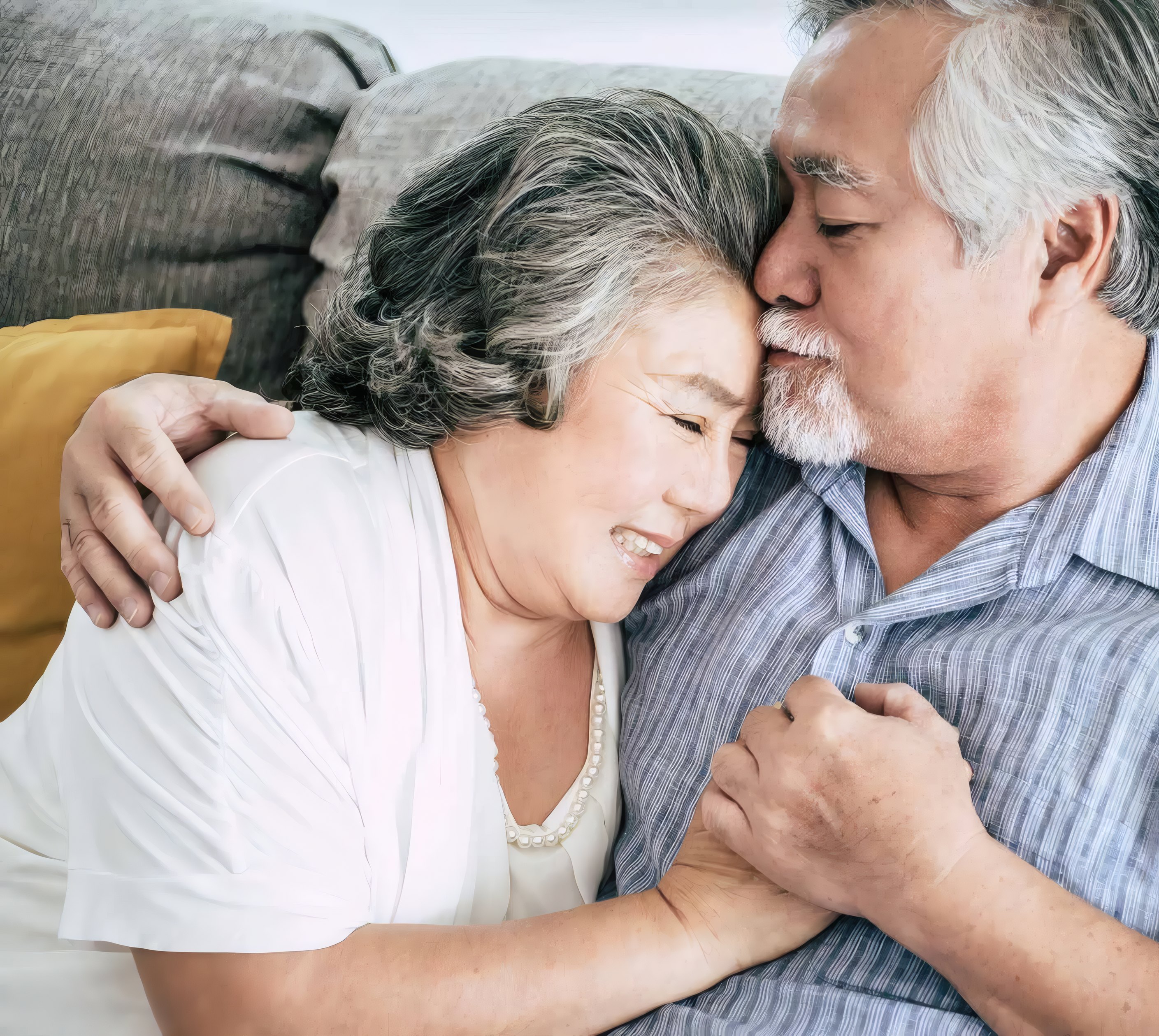 An older couple sharing a warm embrace