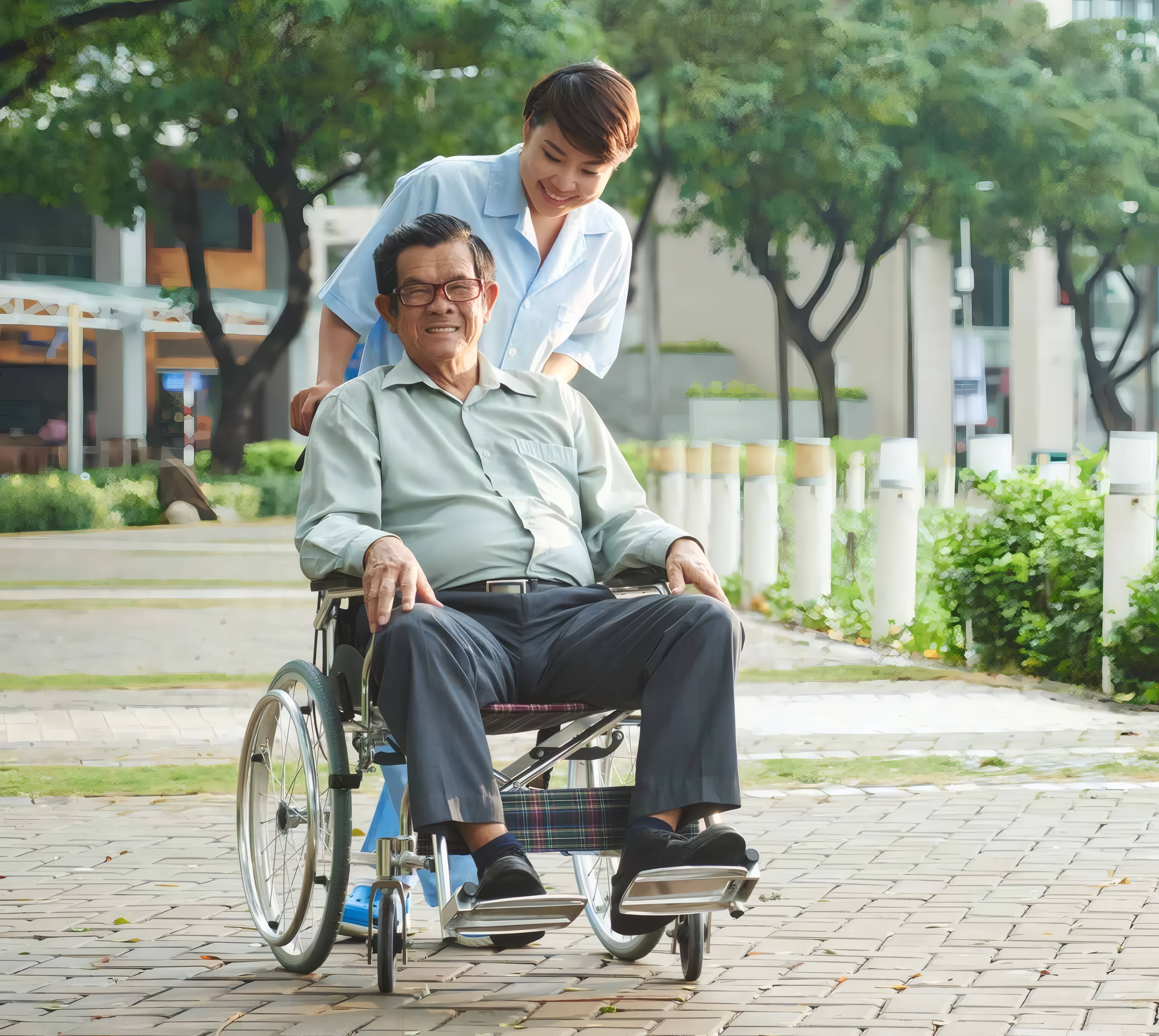 A carer pushing a resident's wheelchair along a garden path