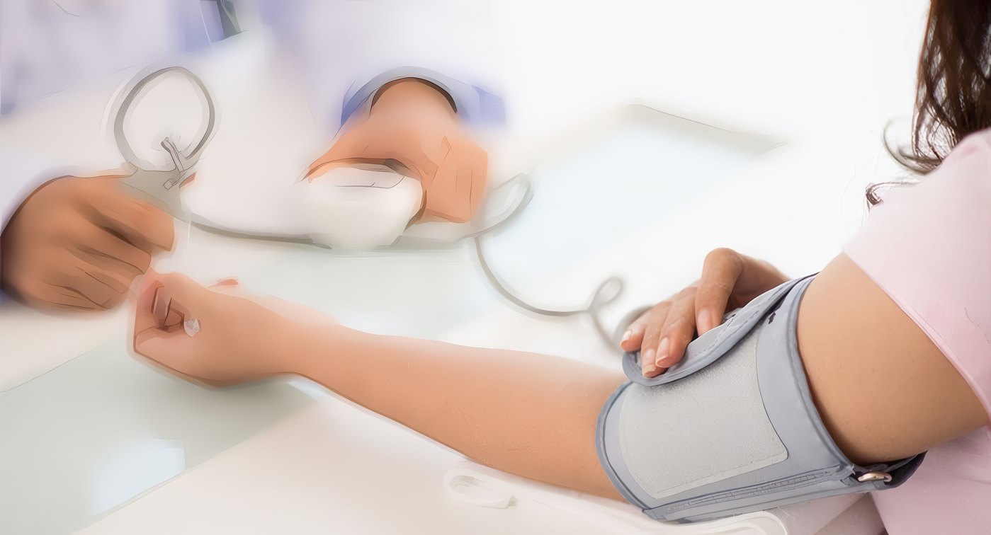 A cardiologist checking a patient's blood pressure