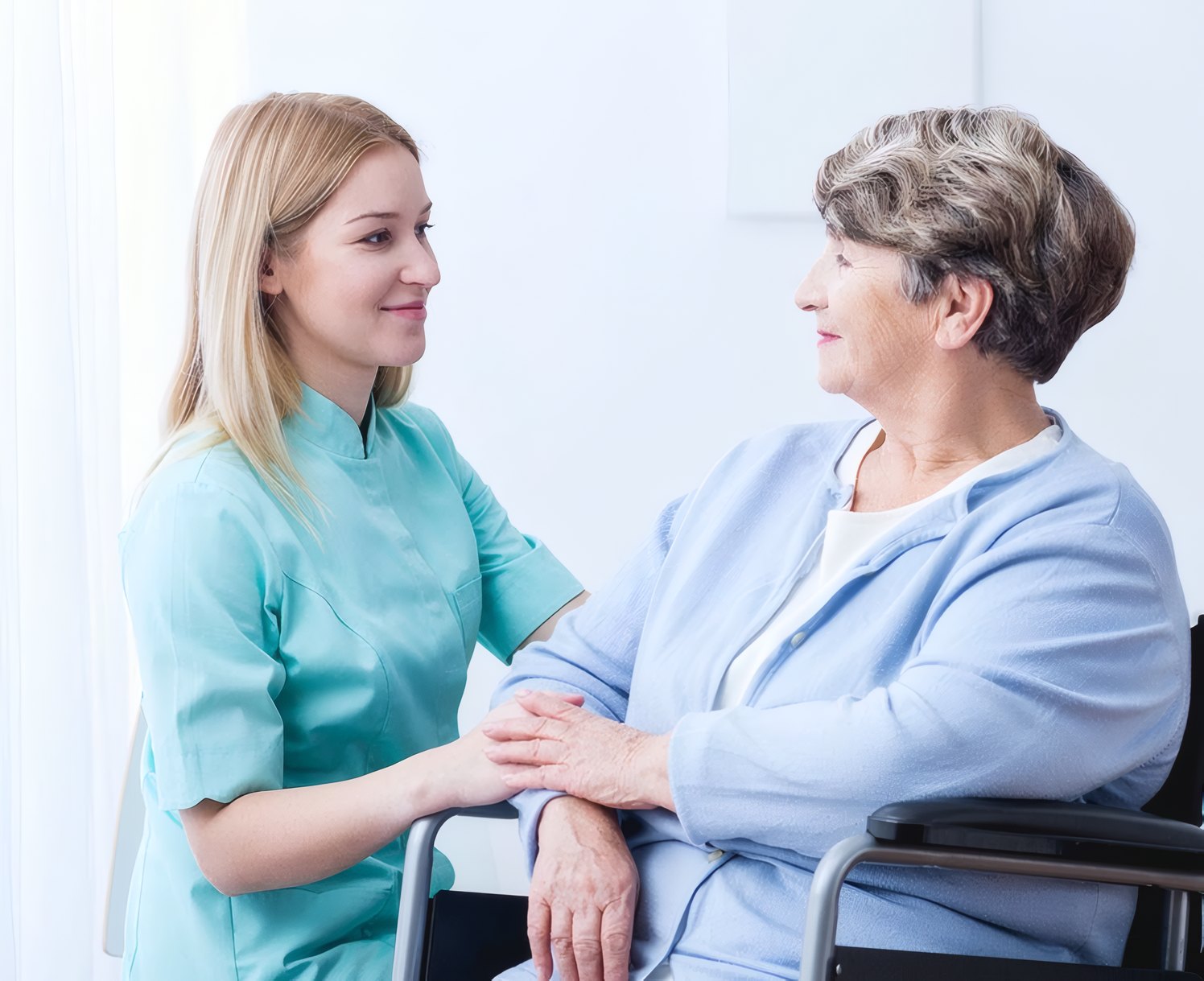 A nurse talking with a senior patient