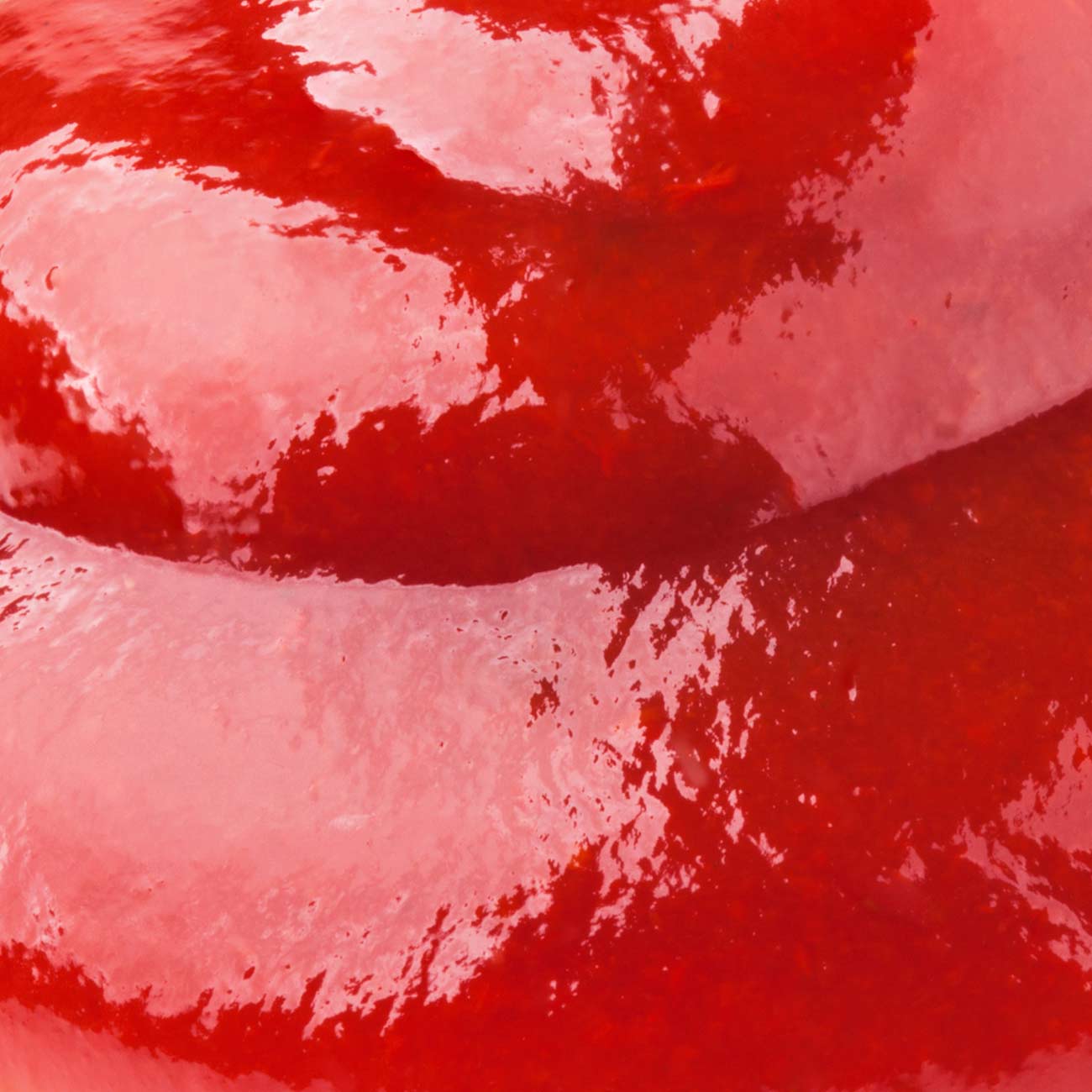 Glossy tomato ketchup up close