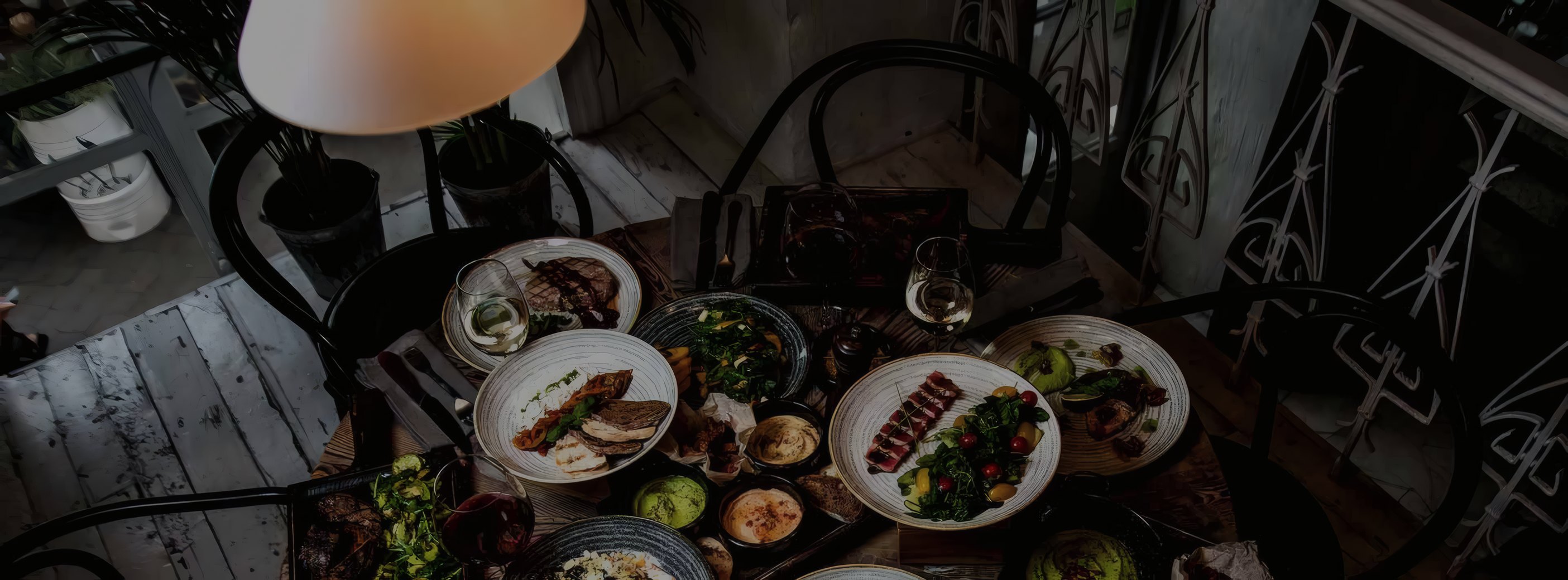 Small plates shared at a table