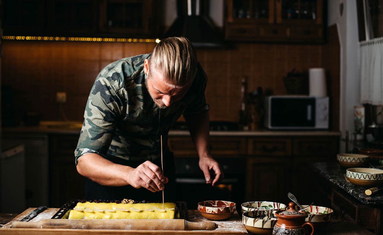 A chef at the stove
