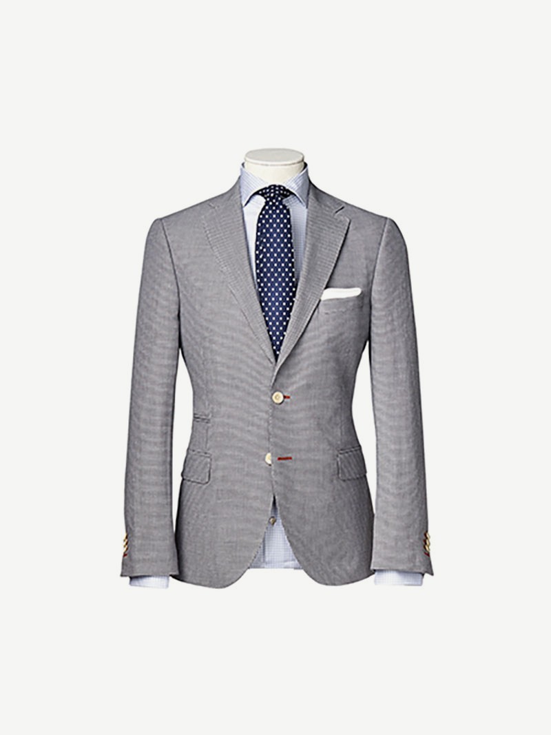 A fine wool check suit on a stand
