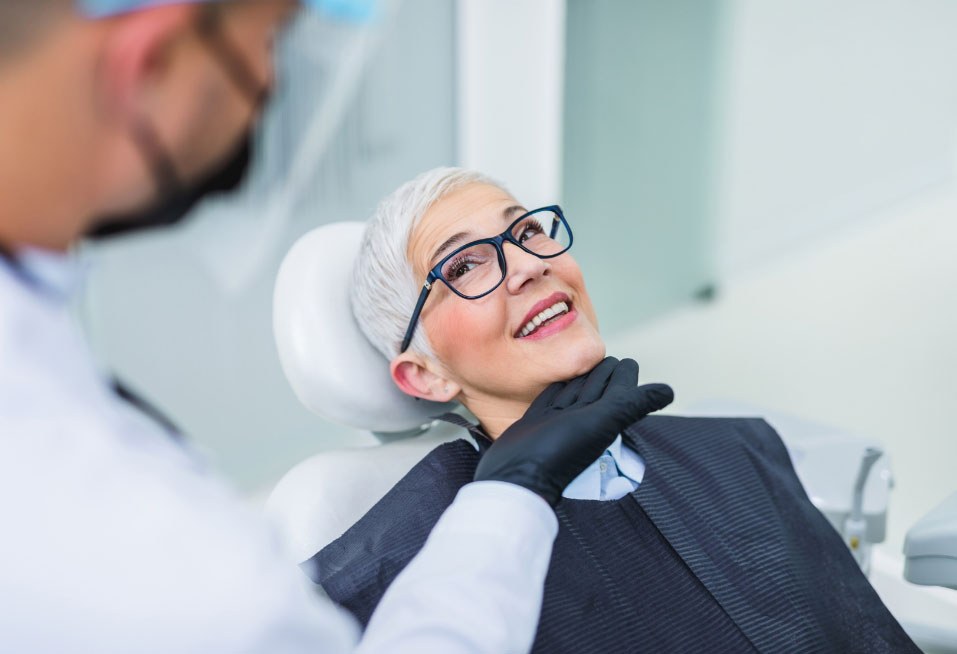A dentist examining a patient