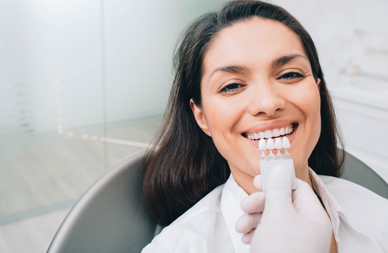 A smiling patient at her checkup