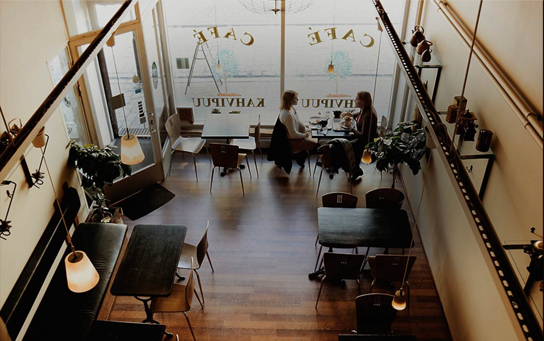 A busy cafe seen from the mezzanine