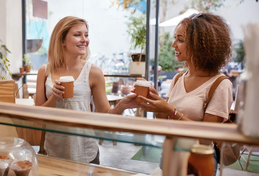Friends with coffee at the Roastery Bar