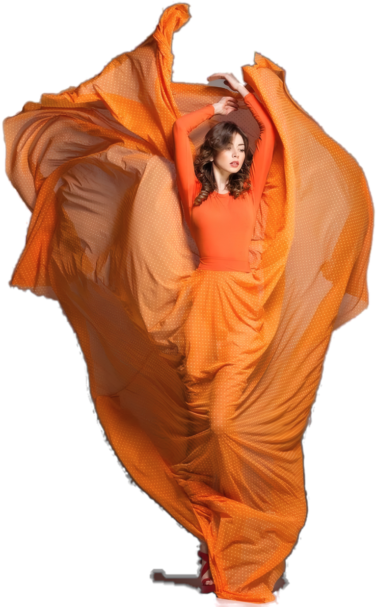 Isabel Navarro walking toward the camera in an orange gown