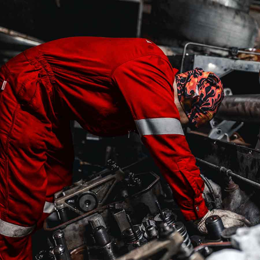 A fitter at an engine block