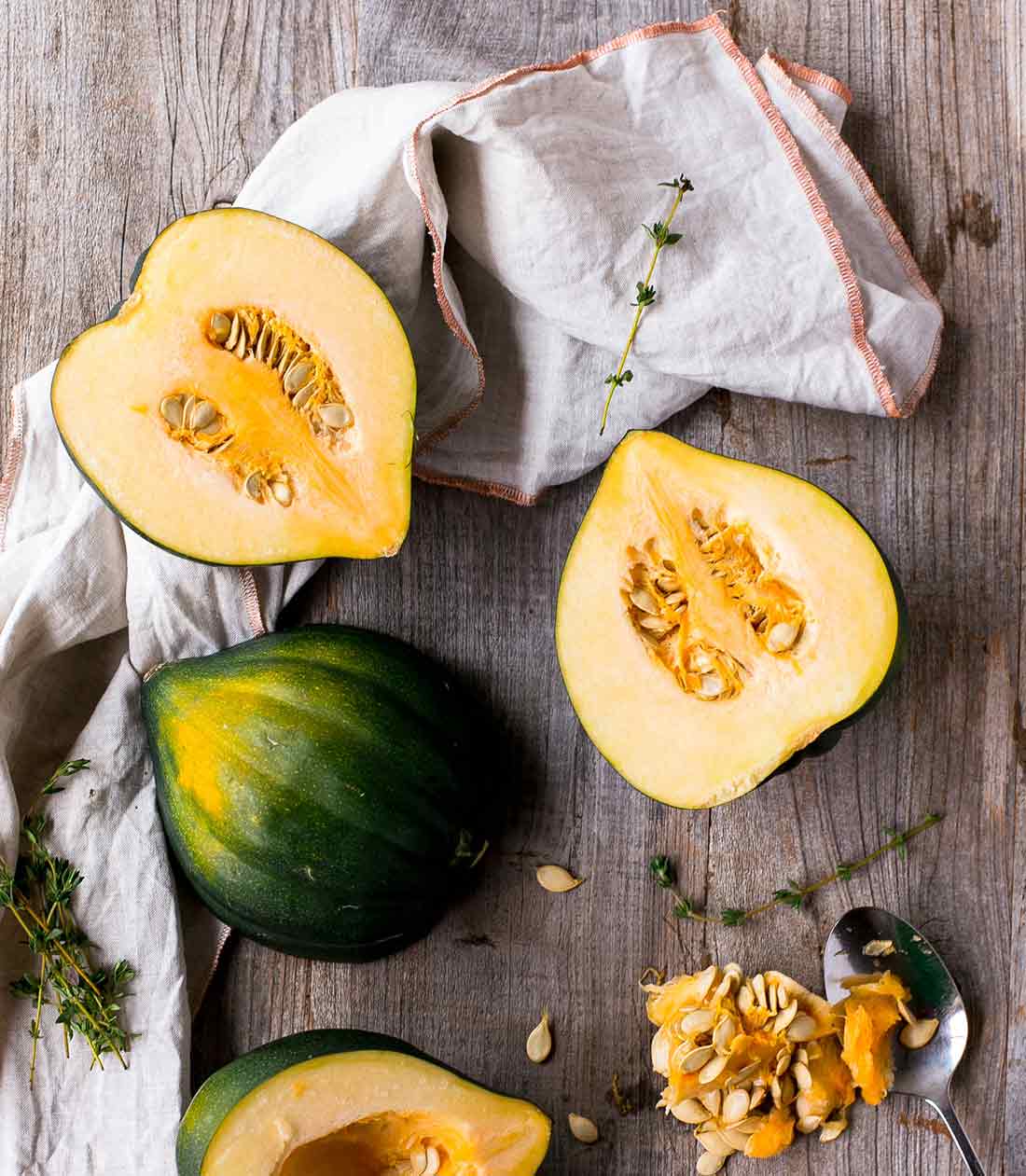 Halved squash on a linen cloth