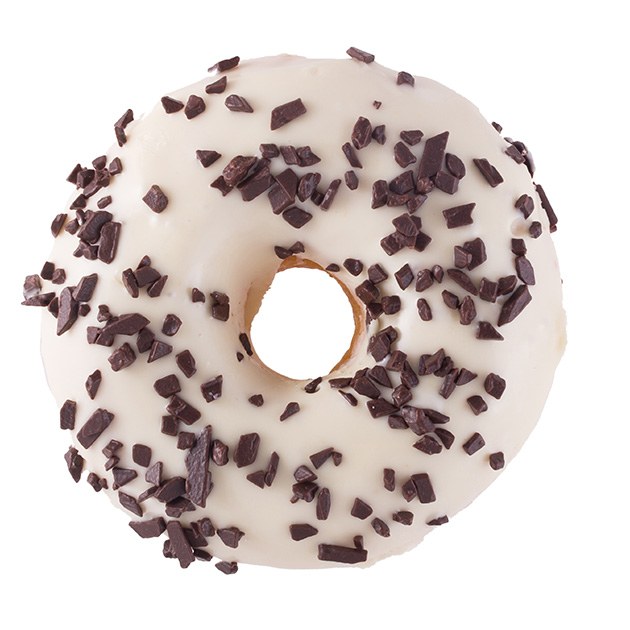 A white glazed donut with chocolate sprinkles