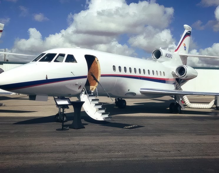 Travellers and crew at the airstairs