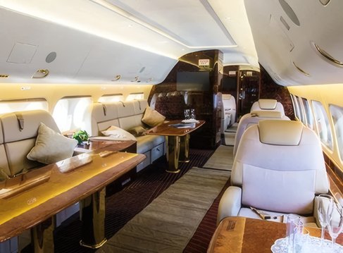 A midsize jet cabin in cream leather