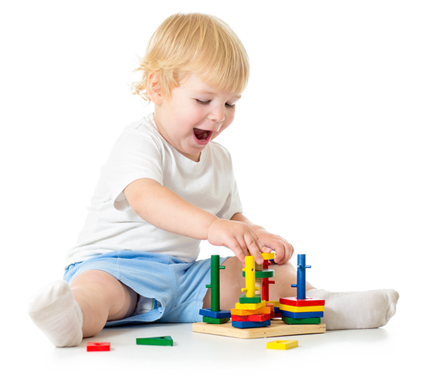 Toddler stacking a colourful shape sorter