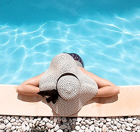 A swimmer floating in the wave pool