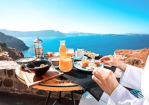 Breakfast on a terrace above the sea