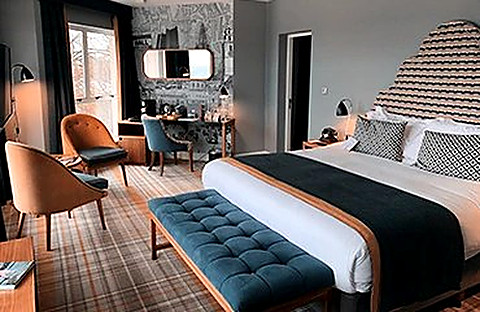 An ocean suite with a sea-blue bench