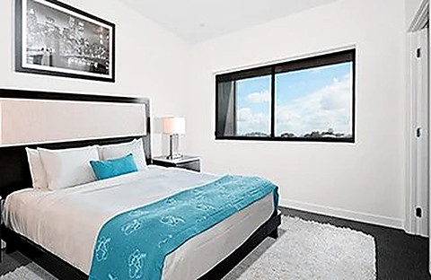 A double room in warm timber