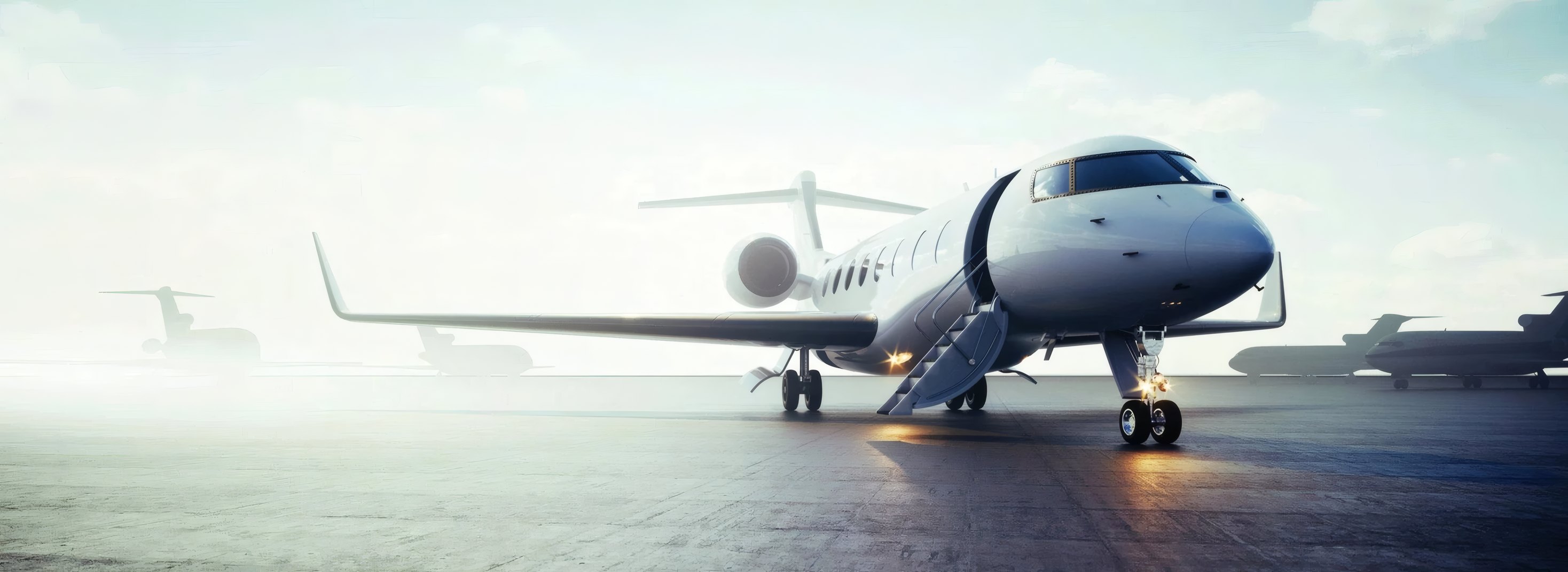 A private jet on the apron at first light