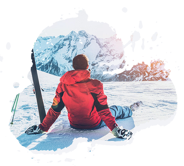 A skier resting in fresh snow