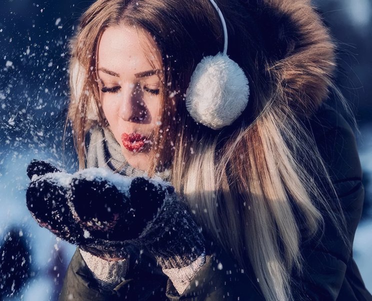 A skier catching snowflakes