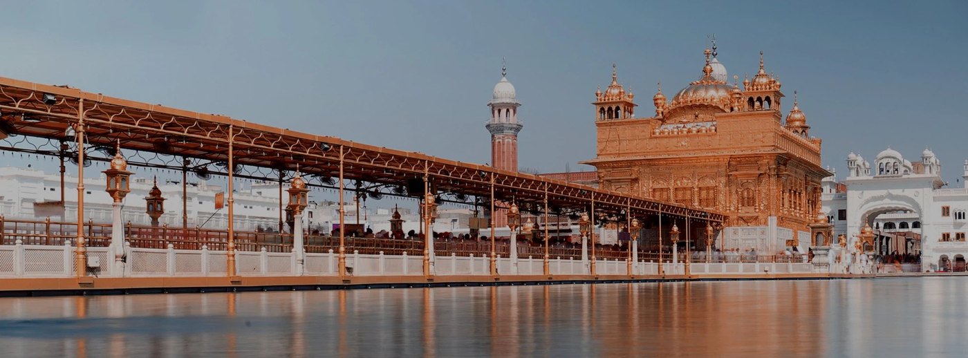 The Golden Temple at Amritsar across its sacred pool