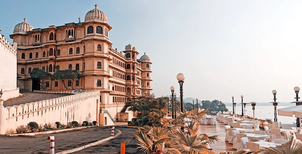 The City Palace at Udaipur rising above Lake Pichola