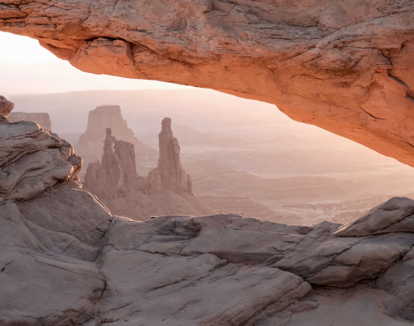 Morning light under a sandstone arch