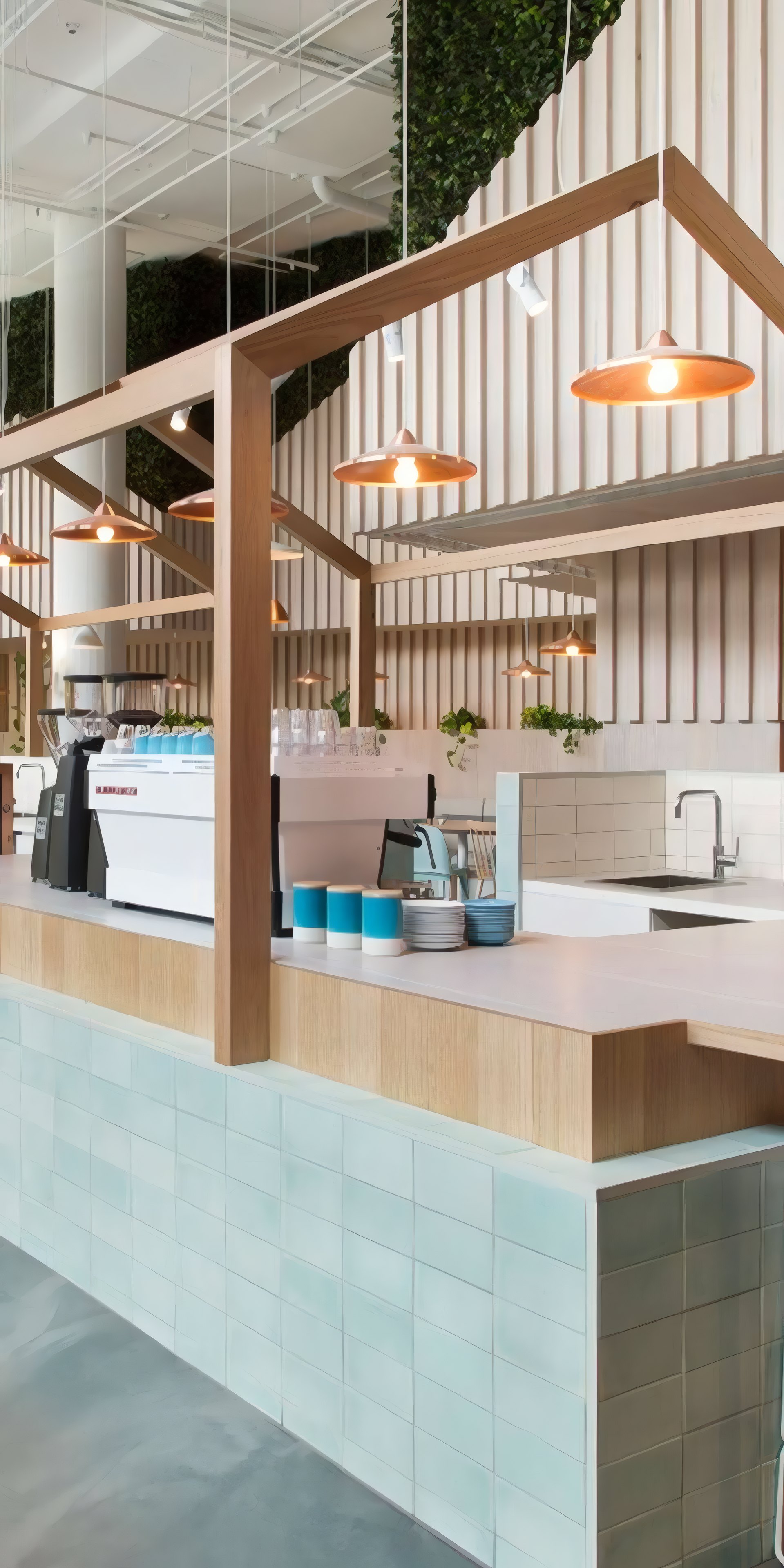 The raw bar counter in pale green tiles