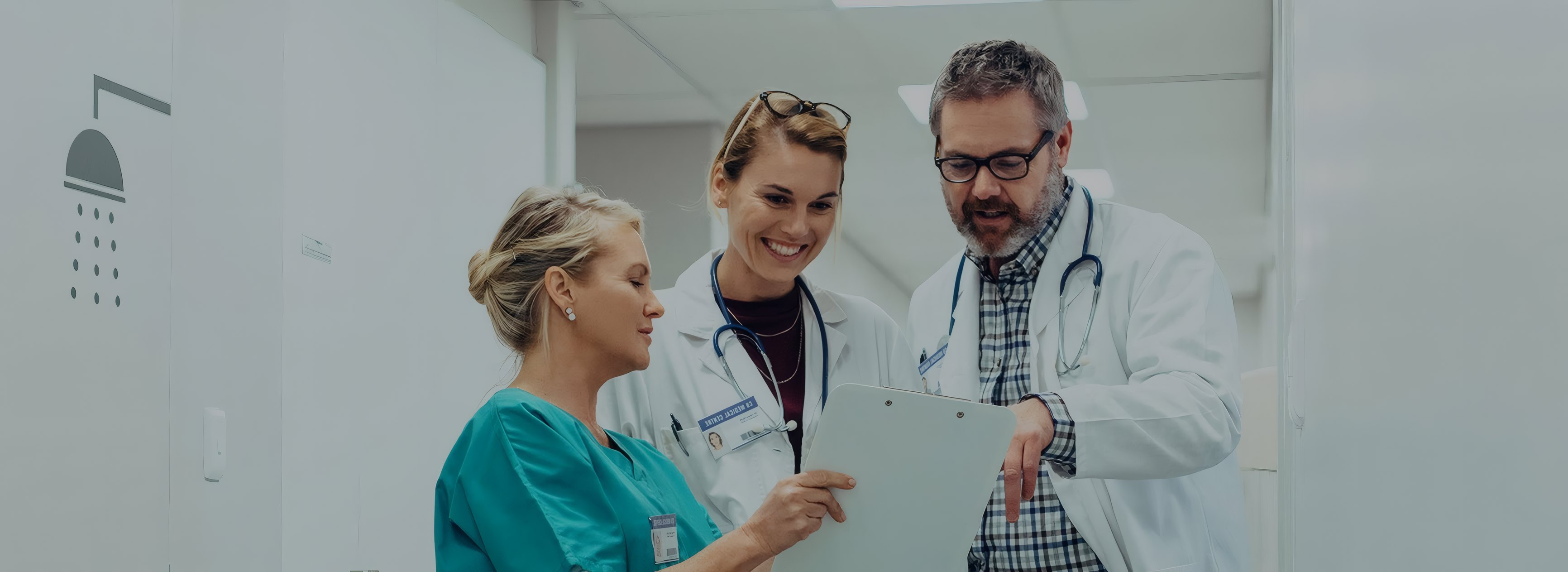 Three doctors reviewing a patient's results