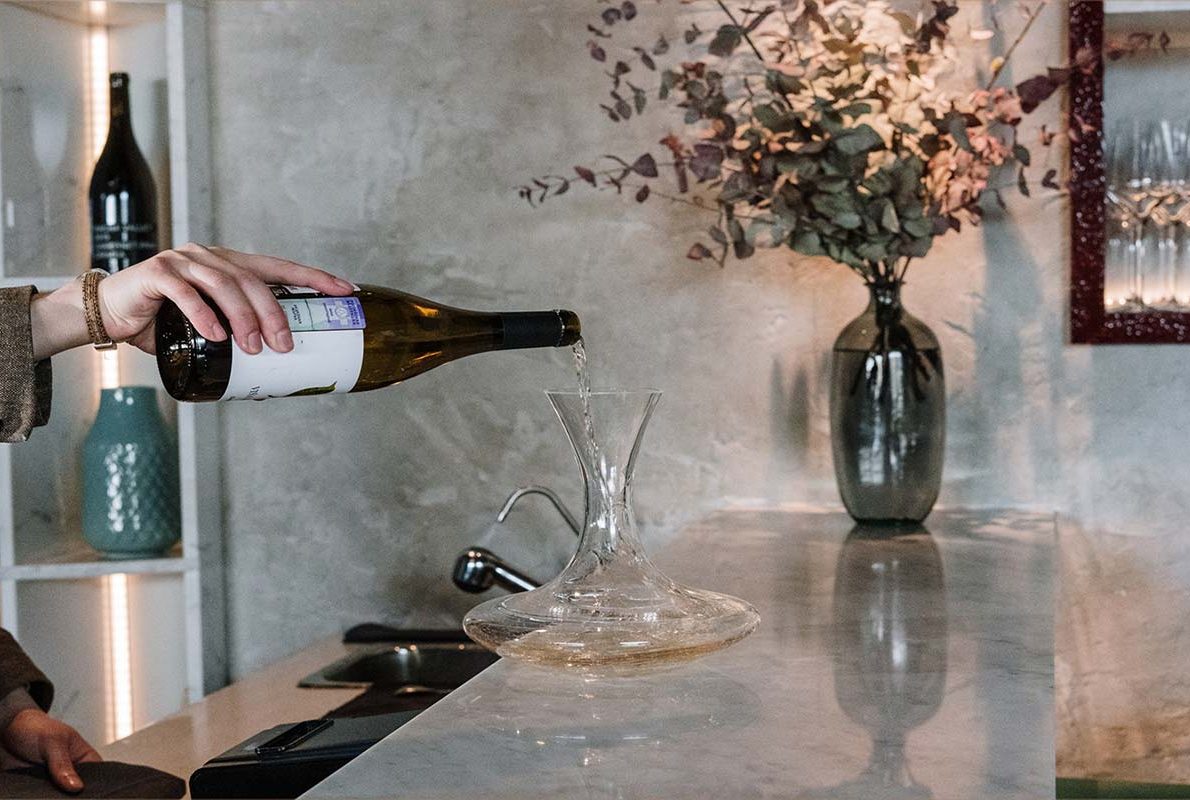 Wine poured at the bar of Oro