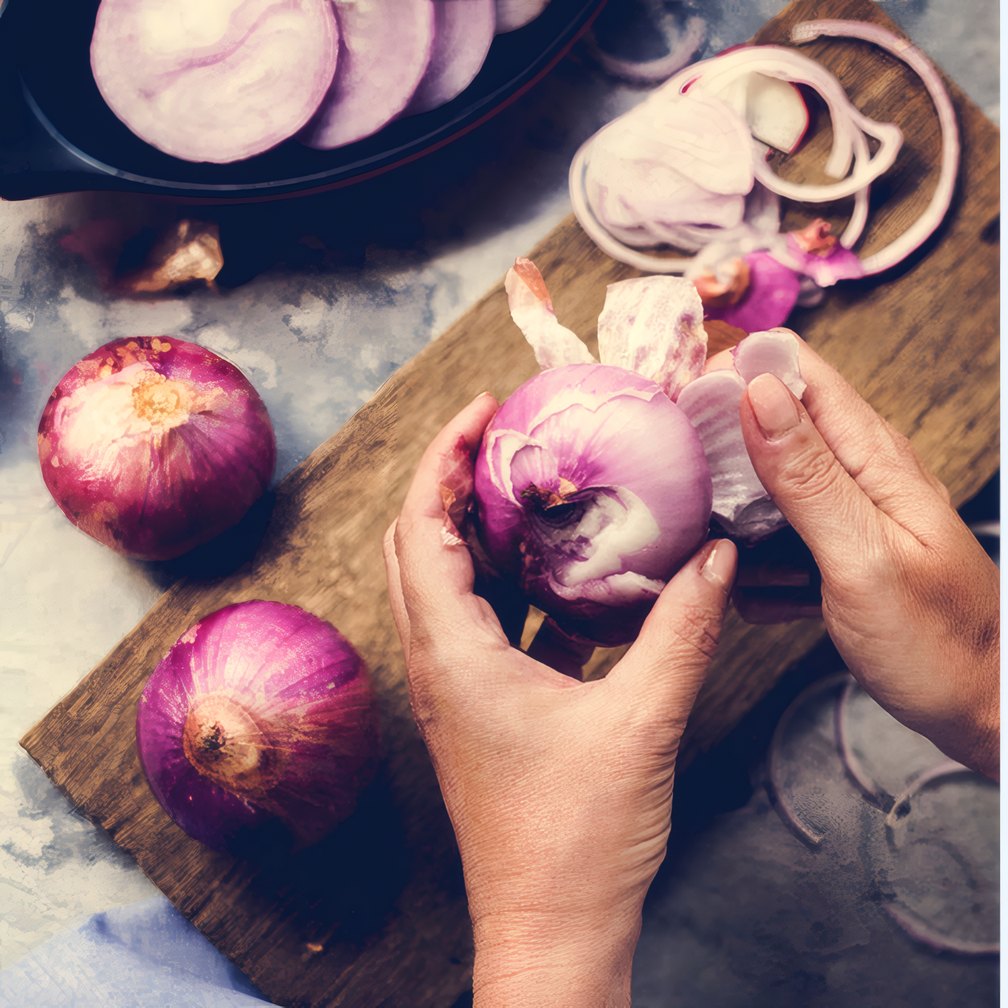 Onions being trimmed on a board