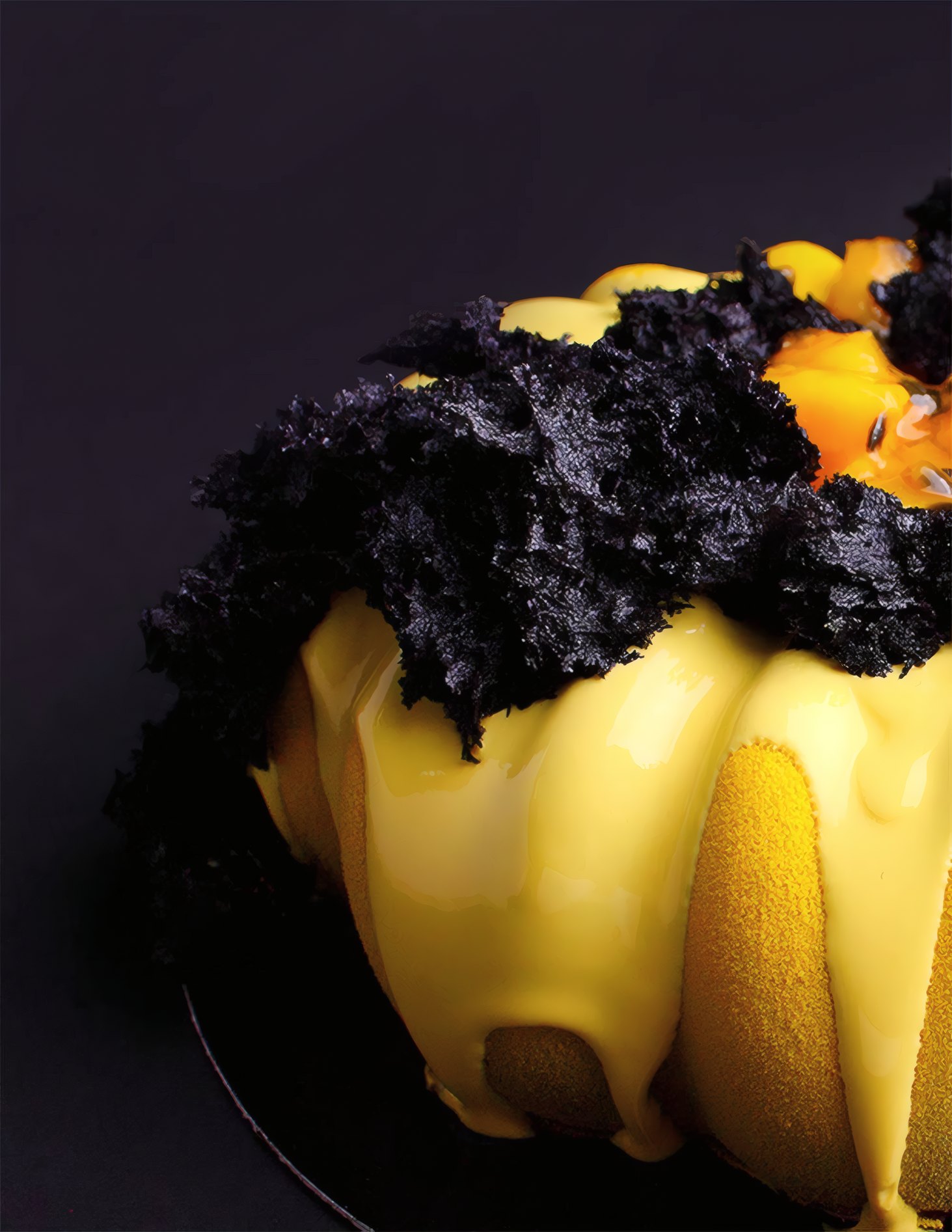 A glazed yellow bundt cake crowned with chocolate crumble