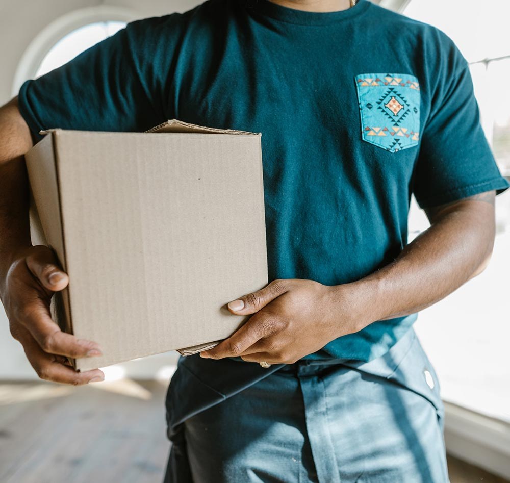 A mover carrying a taped box