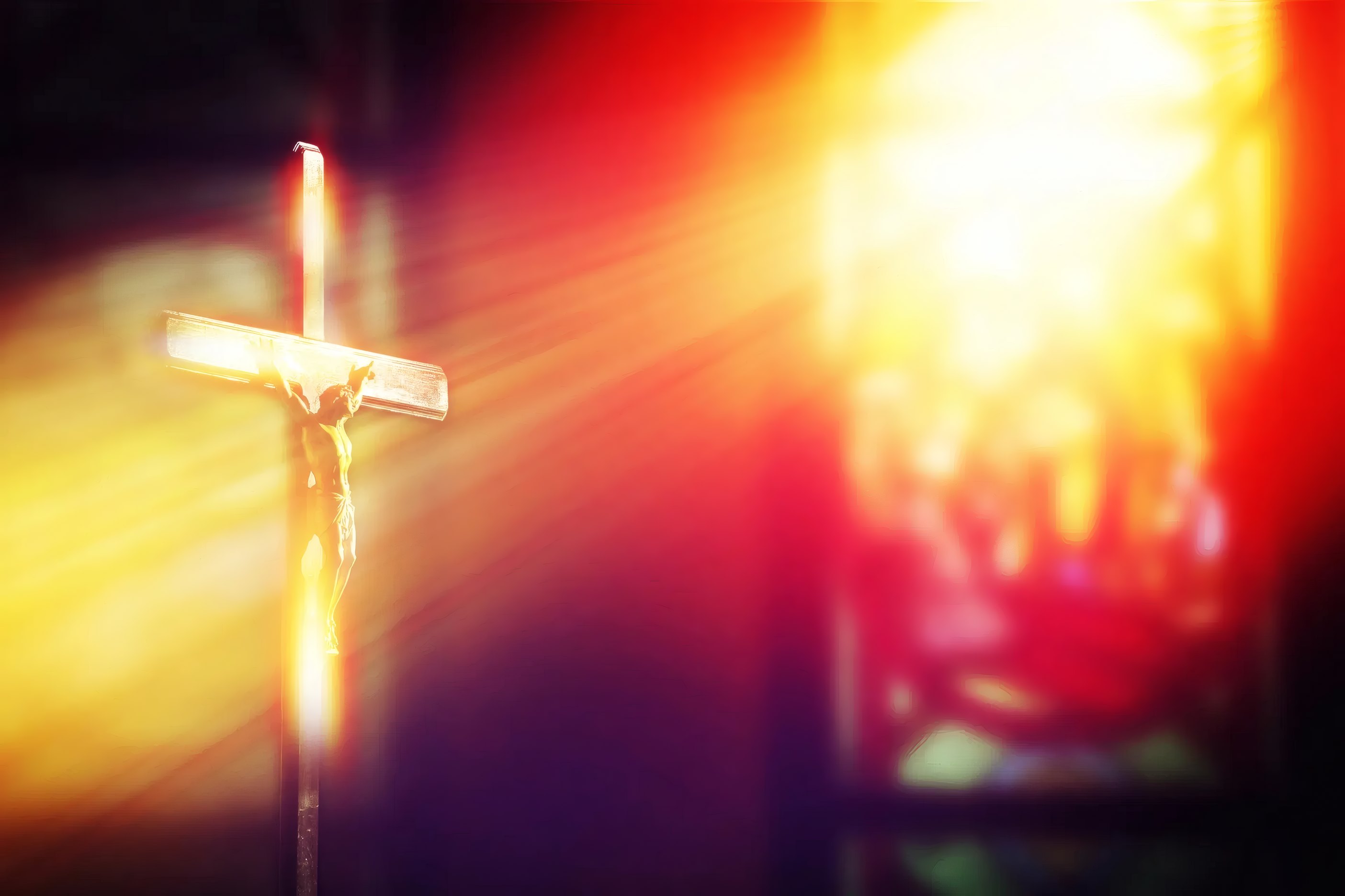 A cross lit by warm window light