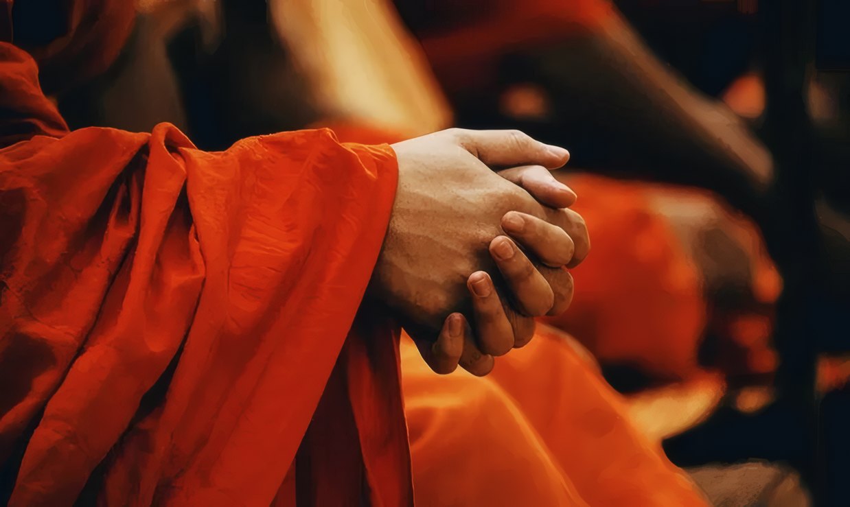 Monks in saffron robes at a festival