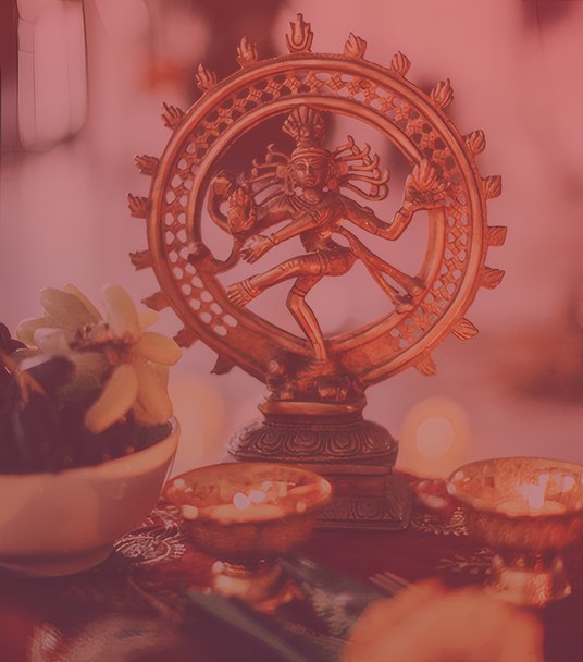 Nataraja murti with lamps