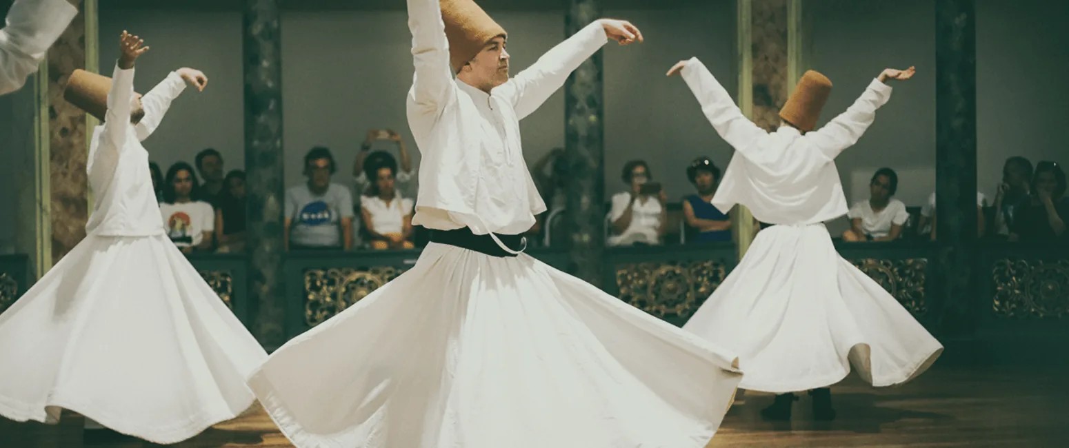 Whirling dervishes at a gathering