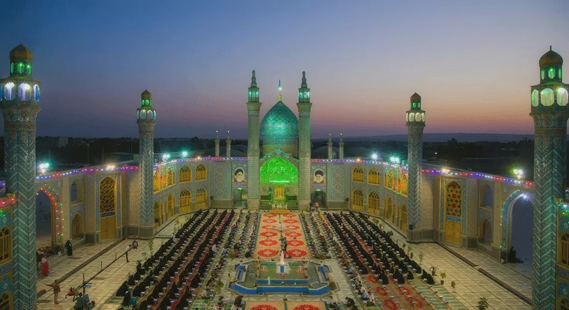 Rows laid out in a mosque courtyard at dusk
