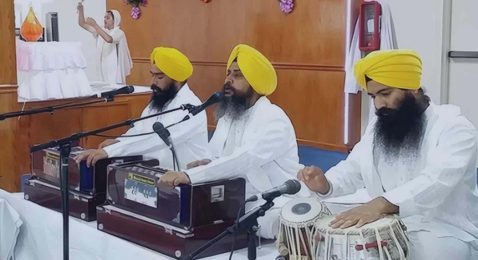 Ragis singing kirtan with harmonium and tabla