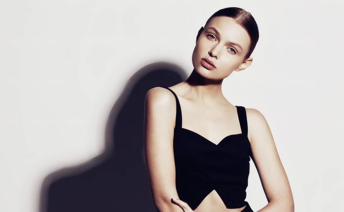 A model in black in the studio