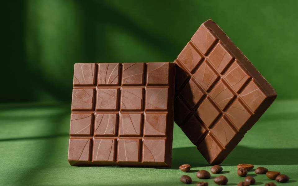 Chocolate tablets on green